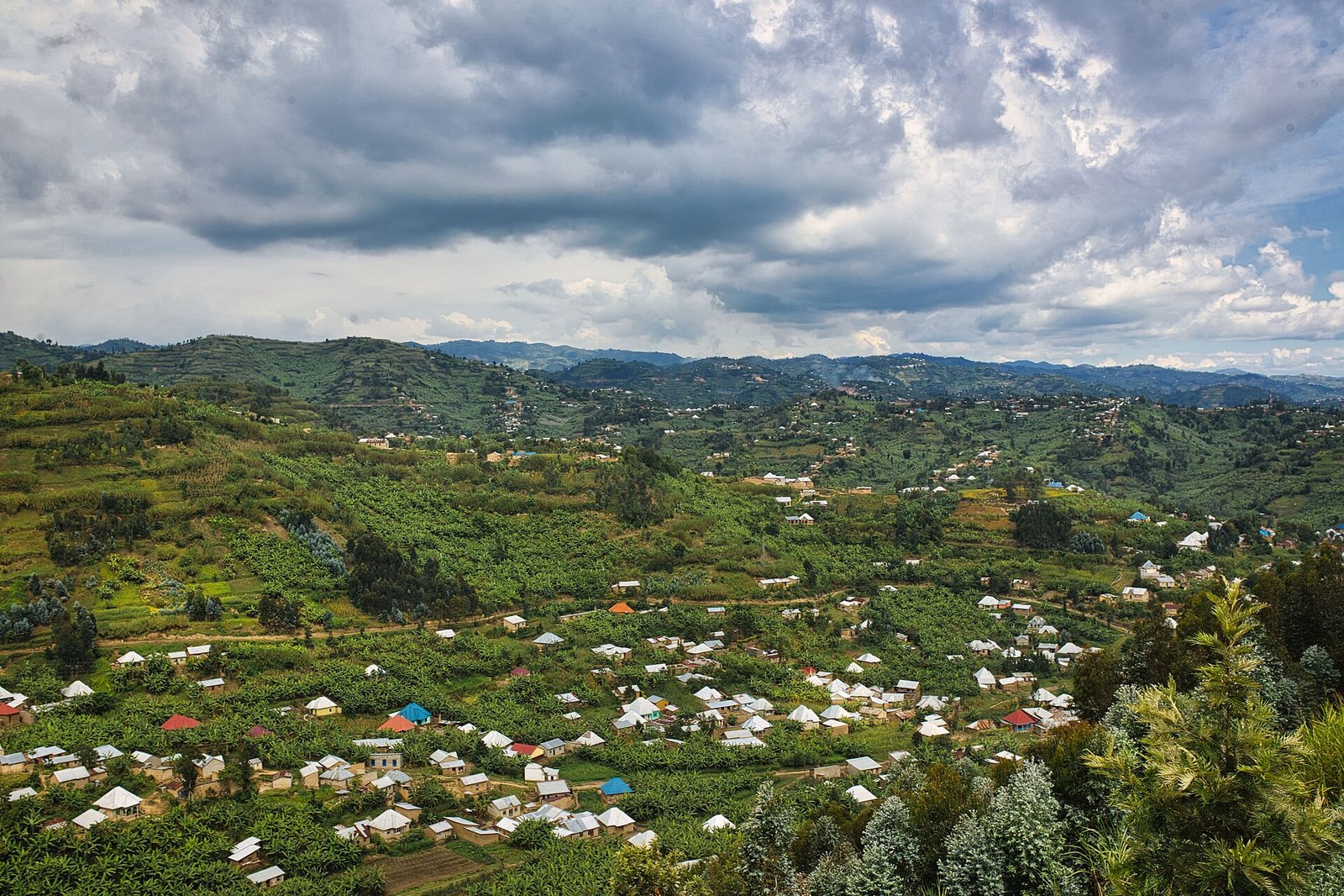 Rwanda explained 2026 — farmland and villages across the hills of Nyamagabe