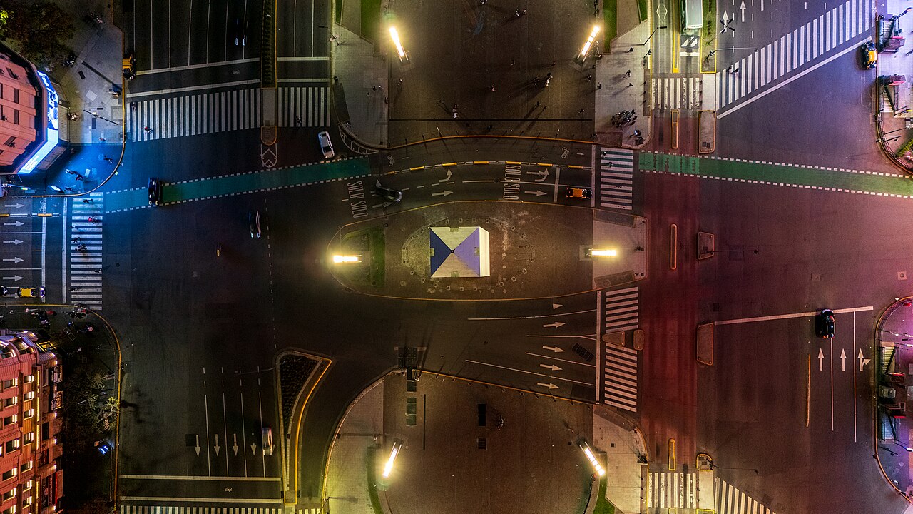 Aerial night view of Avenida 9 de Julio and the Obelisk lit in the colors of the Argentine flag, Buenos Aires