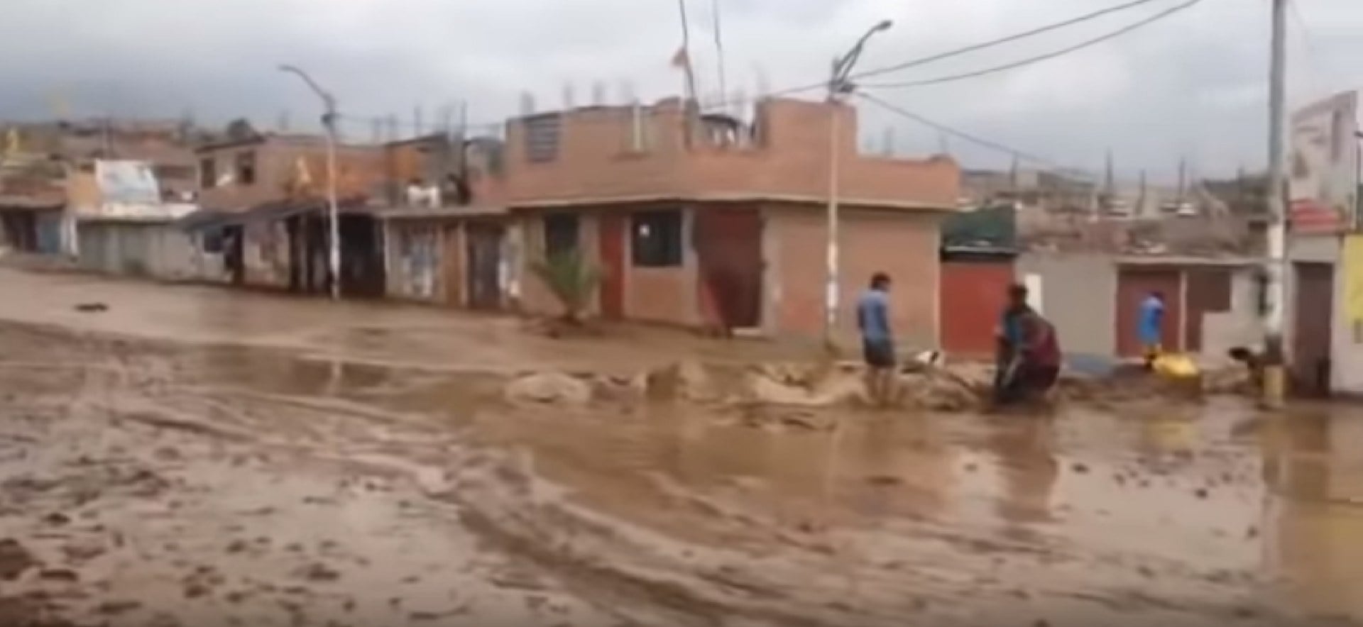 El Niño emergency in Peru — flooded street in Calana, Tacna, during the 2019 coastal El Niño