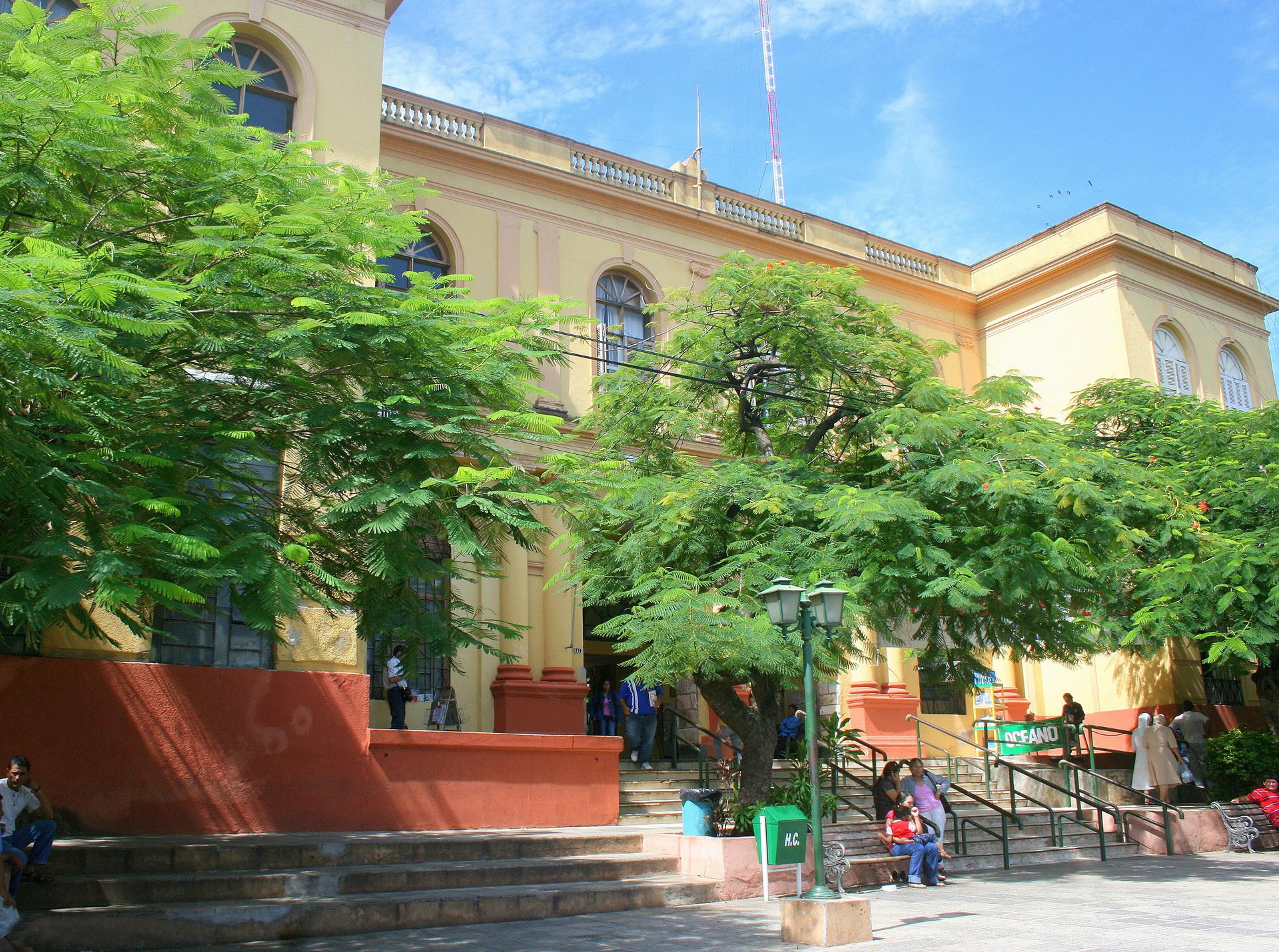 The entrance of the Hospital de Clinicas in Asuncion, Paraguay, with patients on the steps