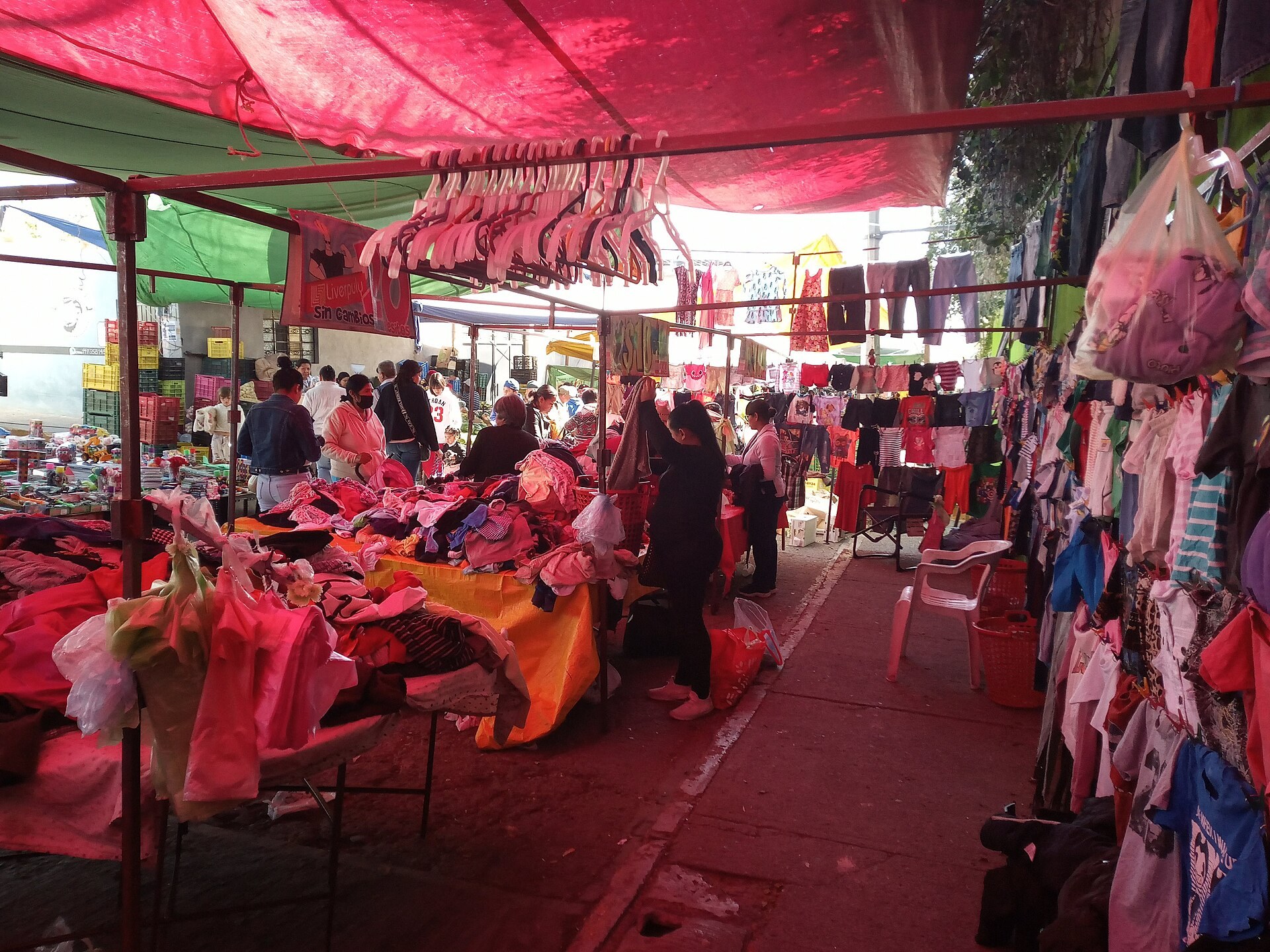 Second-hand clothing stall at a street market in Jesus Maria, Aguascalientes, Mexico