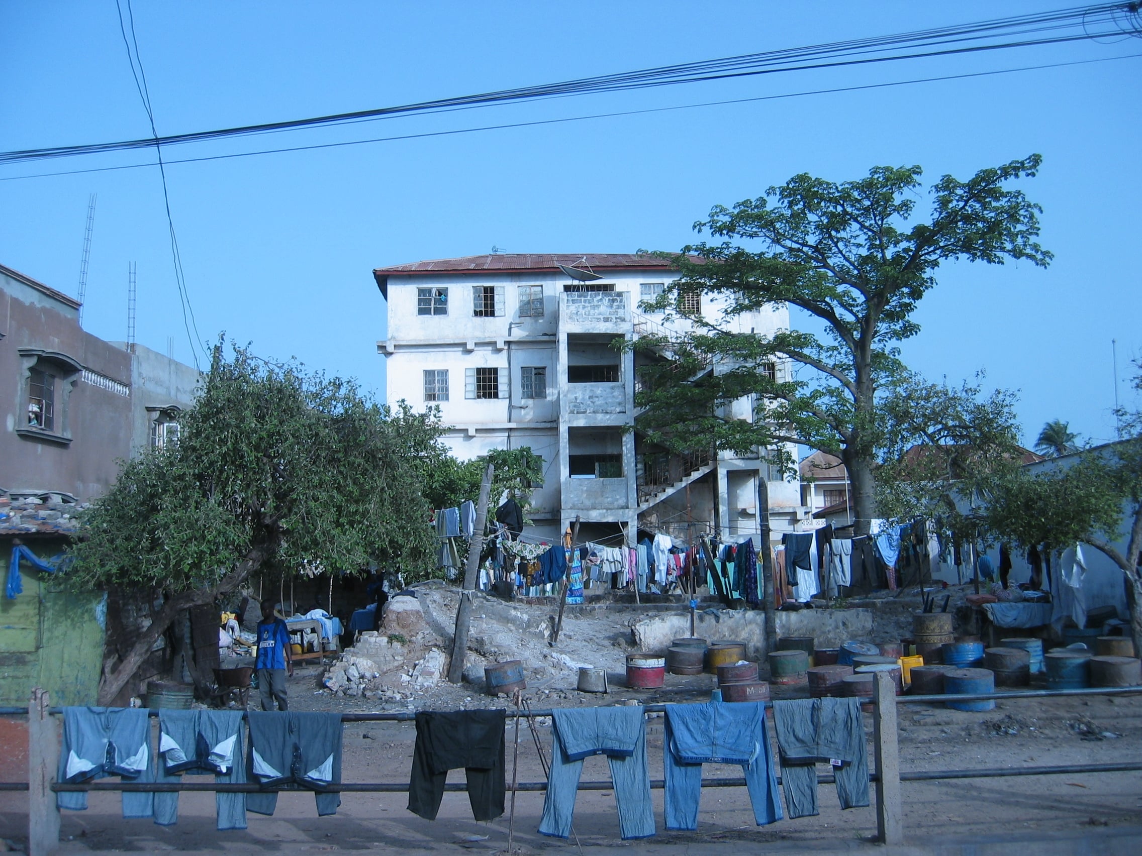 A residential street in Banjul, The Gambia, with overhead power lines