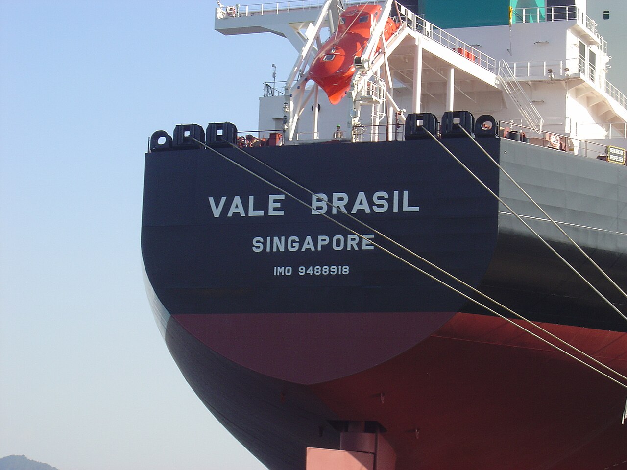 The stern of the Valemax ore carrier Vale Brasil showing its name, port of registry Singapore and IMO number