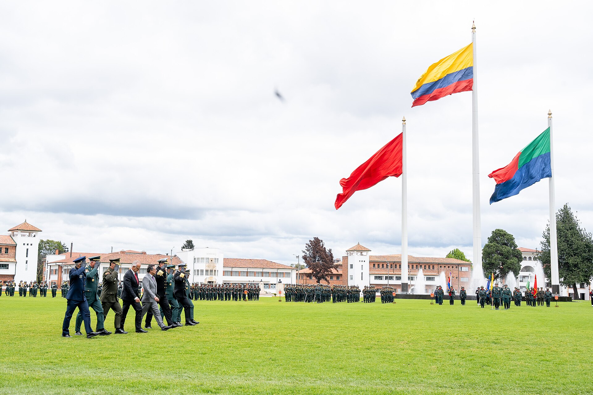 A Colombian military ceremony with officers standing in formation