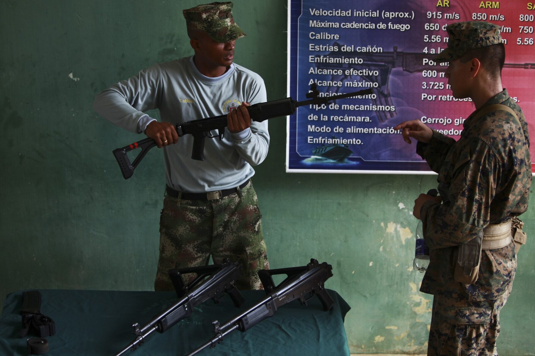 A Colombian soldier holding a rifle during a field exercise