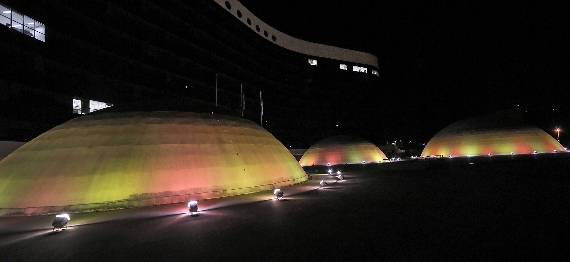 The facade of Brazil's Superior Electoral Court building lit at dusk in Brasília