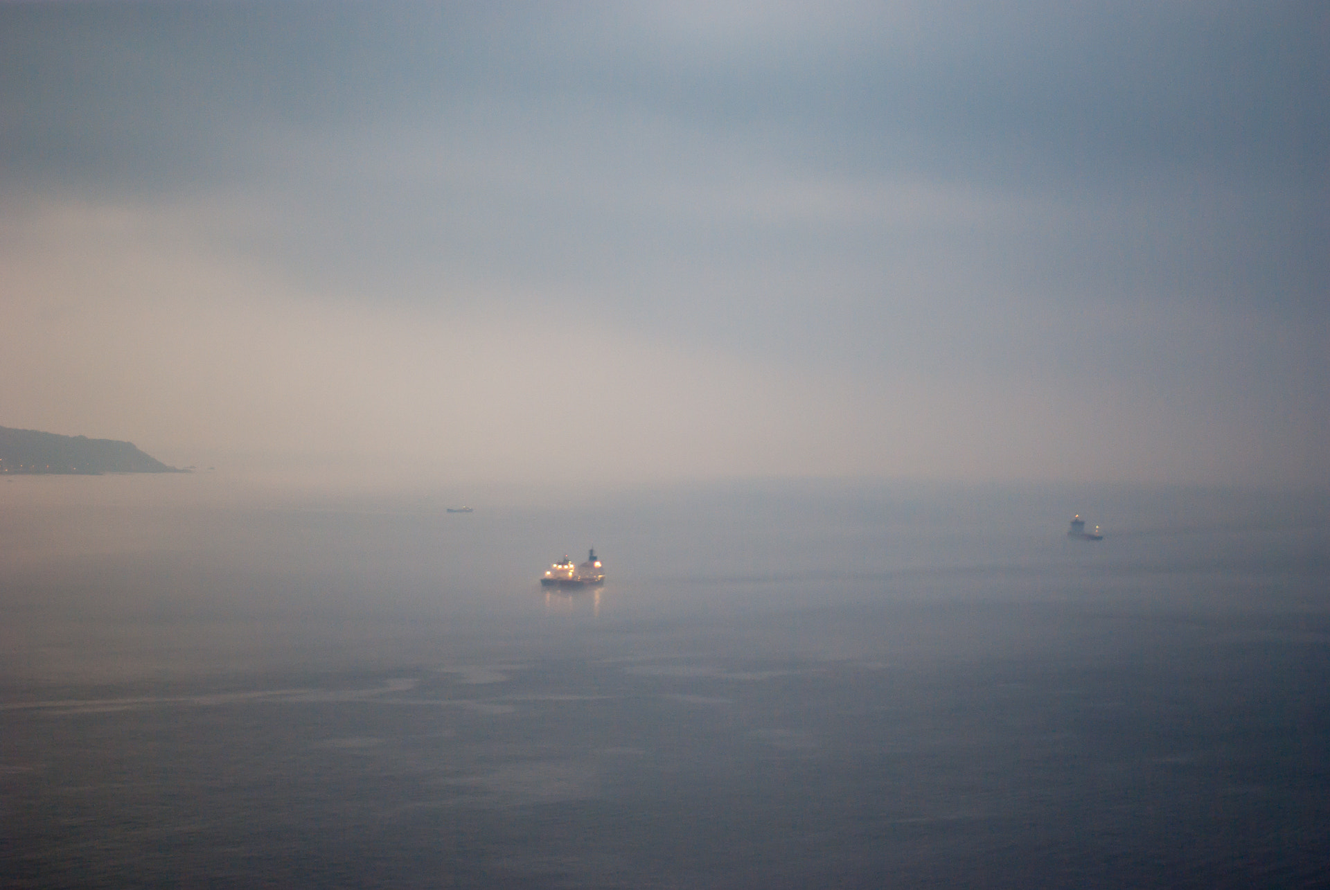 The city of Ceuta seen in fog from the sea