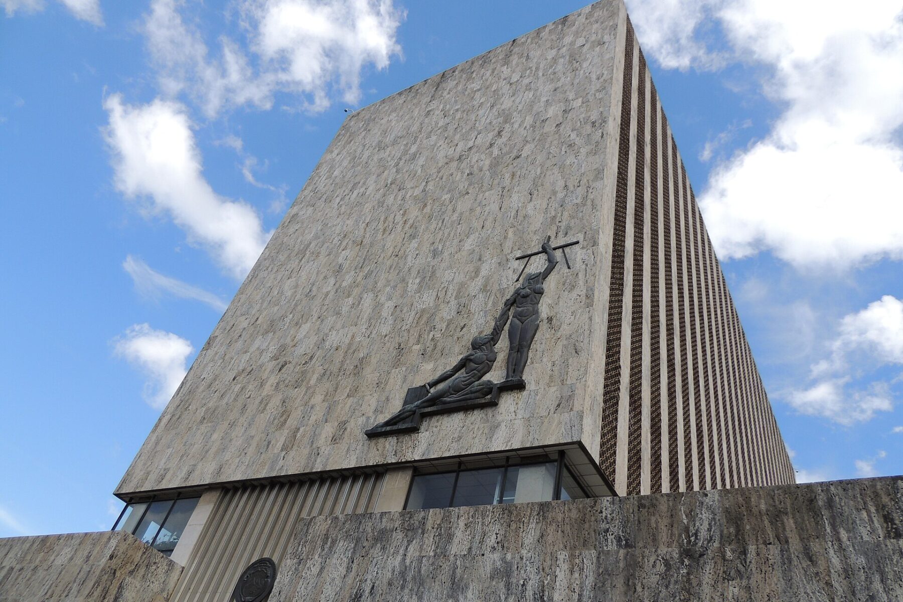 Supreme Court of Justice building in San José, Costa Rica, with a bronze relief on its stone facade