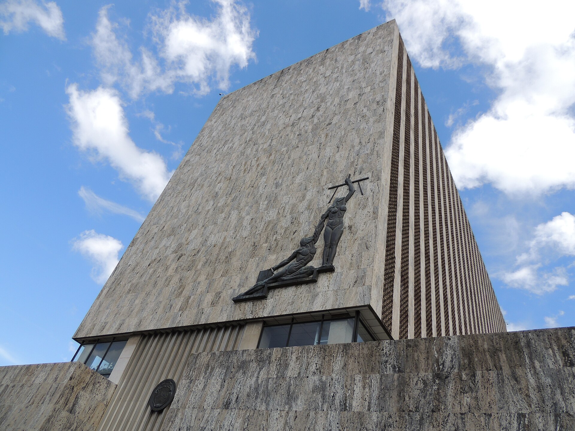 Supreme Court of Justice building in San José, Costa Rica, with a bronze relief on its stone facade