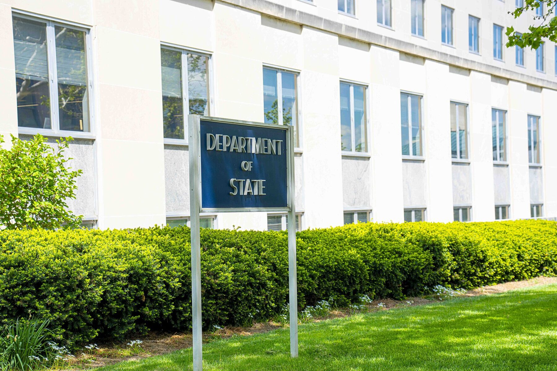 Department of State sign in front of the Harry S. Truman Building in Washington