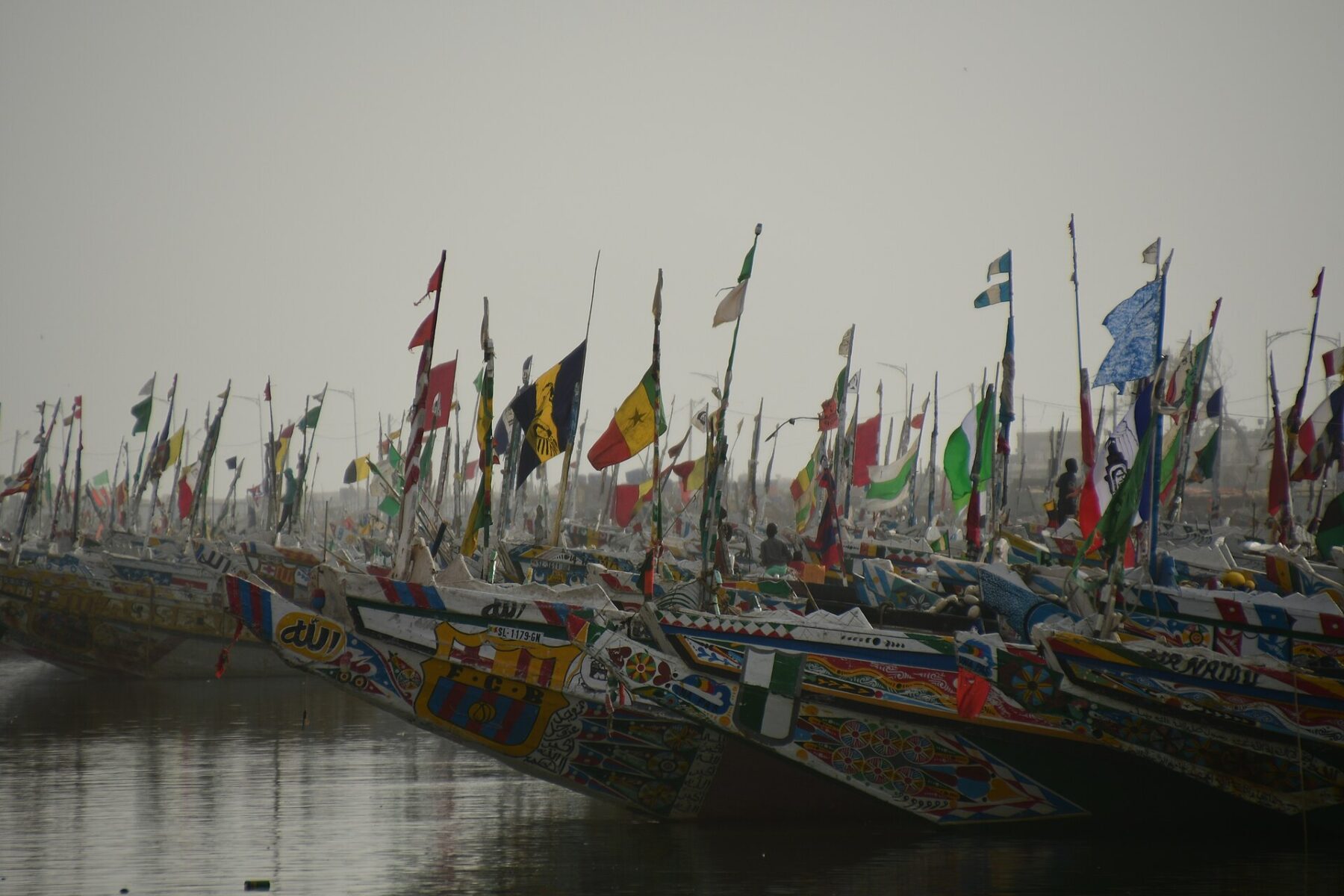 Senegal explained 2026 — painted fishing pirogues moored at Saint-Louis