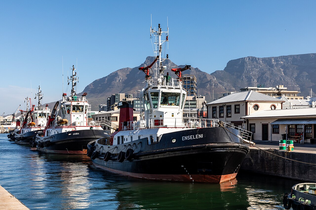 South Africa explained 2026 — tugs at the Cape Town waterfront below Table Mountain