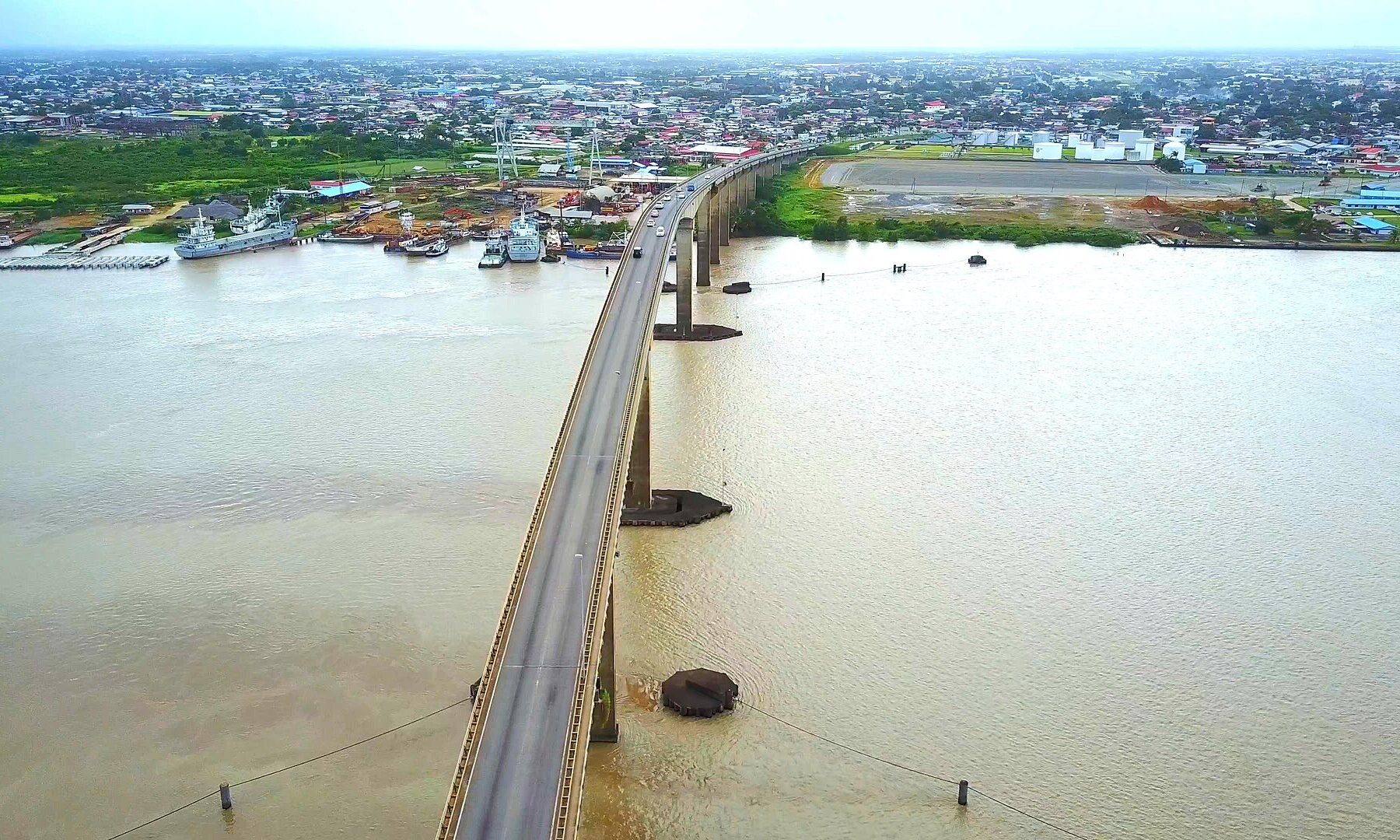 Suriname explained 2026: aerial view of Paramaribo and the Jules Wijdenbosch Bridge over the Suriname River