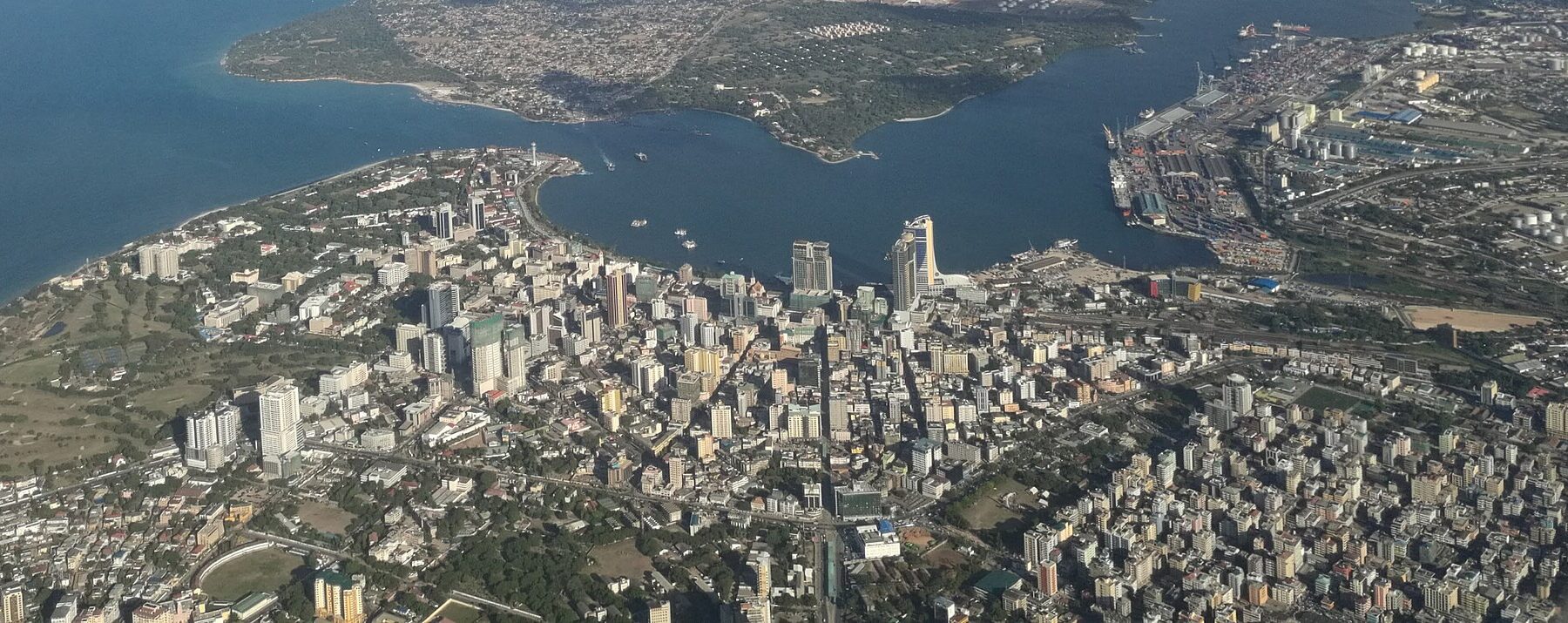 Tanzania explained 2026 — aerial view of central Dar es Salaam and its port