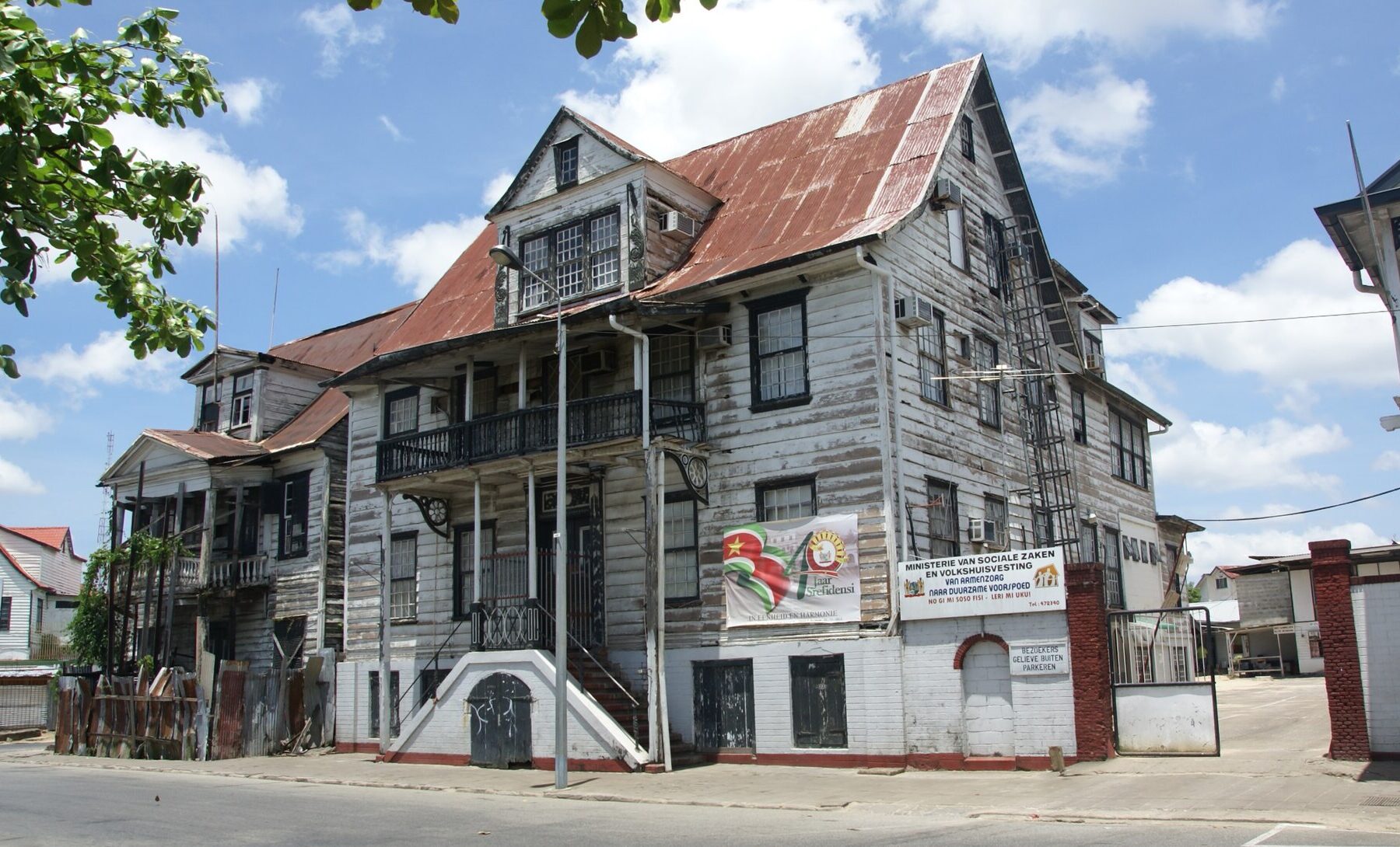 taxes in suriname expats 2026 Paramaribo Waterkant historic buildings
