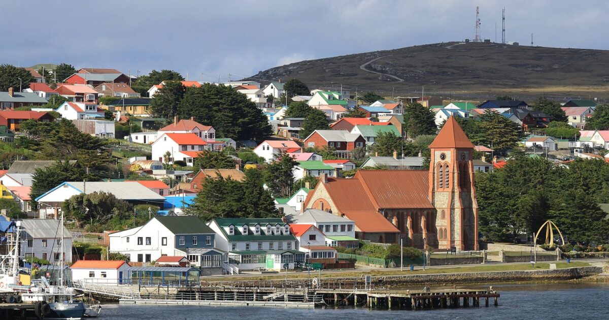 The waterfront at Stanley in the Falkland Islands with houses and a church