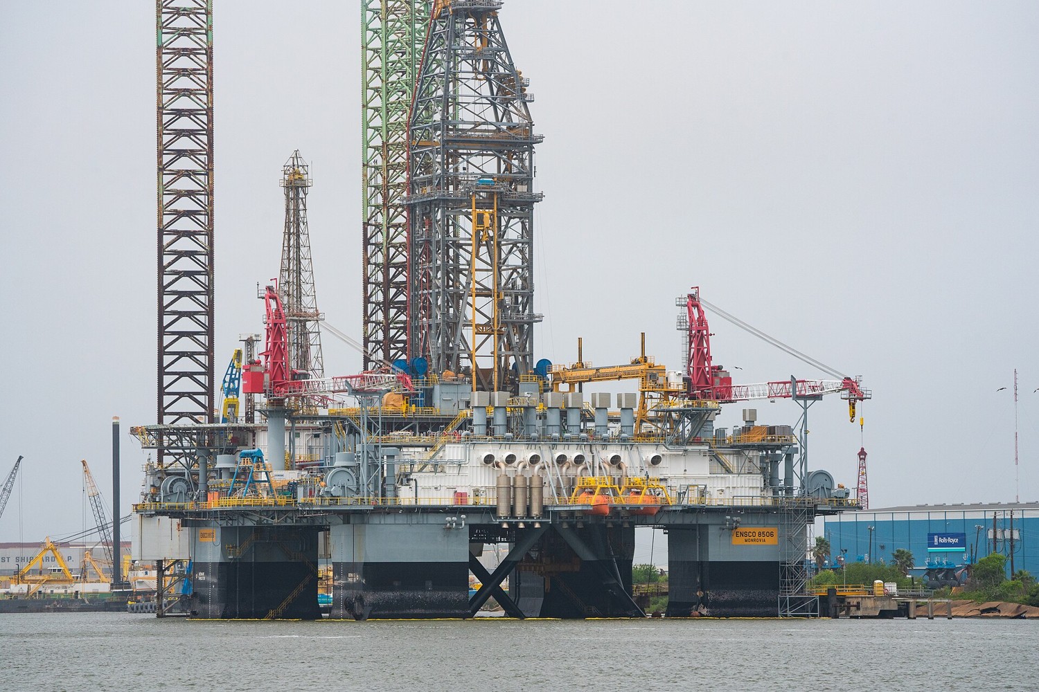 A semi-submersible offshore drilling rig moored in port