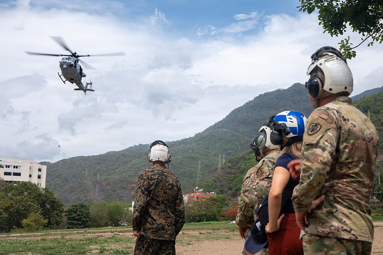 US Marine Corps helicopter conducts an aerial damage assessment flight over Caracas after the June 2026 earthquakes