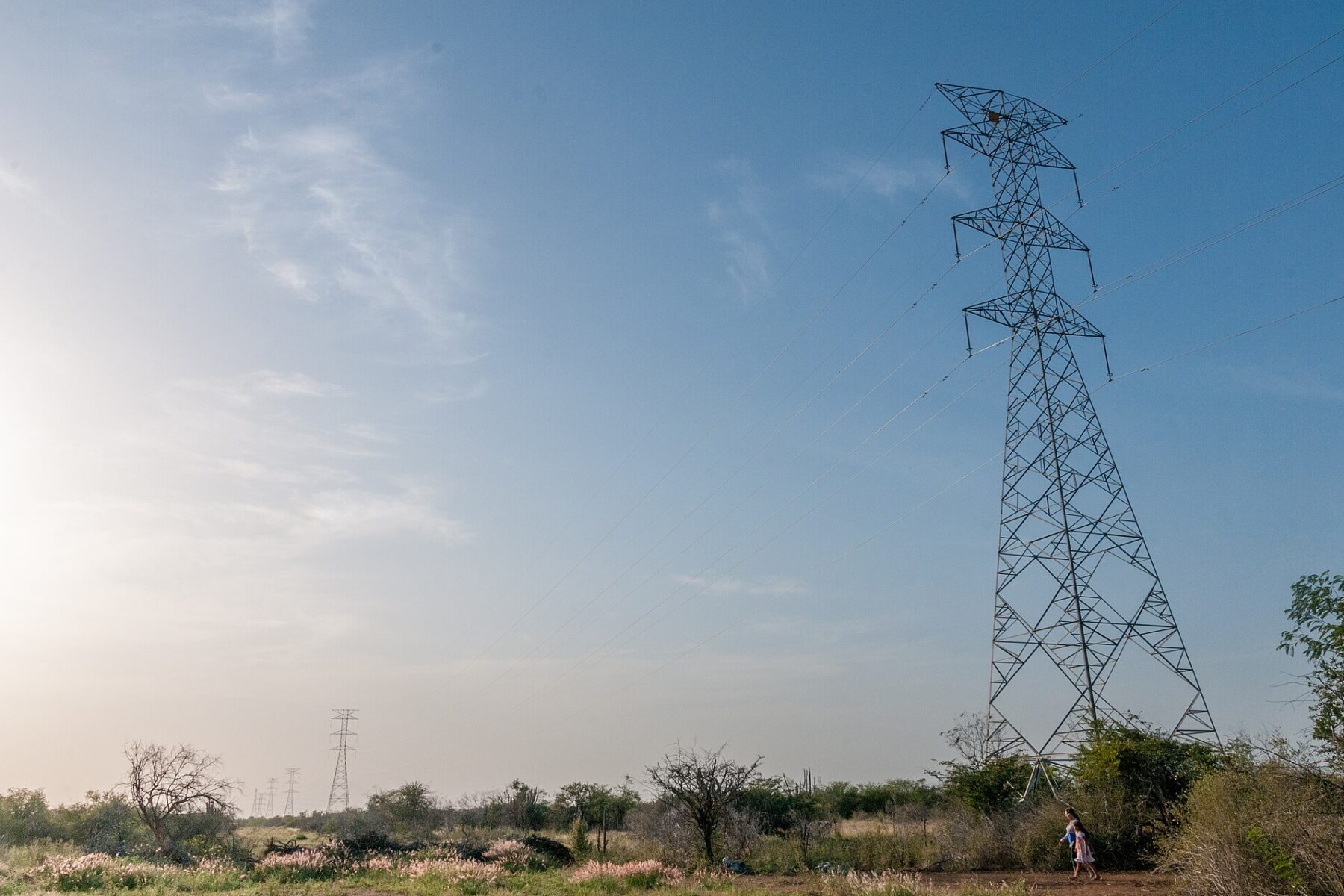 High voltage transmission pylon in dry scrubland in Venezuela