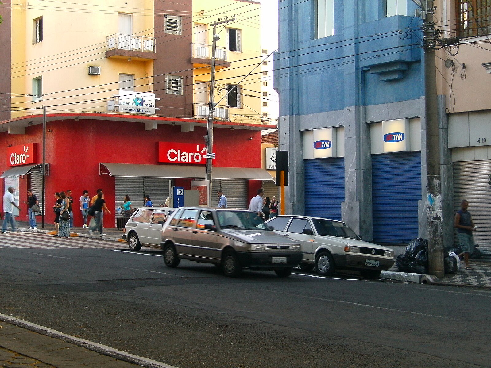 América Móvil in Brazil: a Claro shop across from a TIM shop on a Brazilian street
