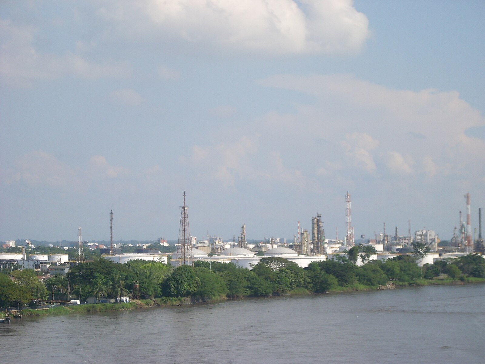 storage tanks and towers of the Barrancabermeja refinery on the Magdalena River in Colombia
