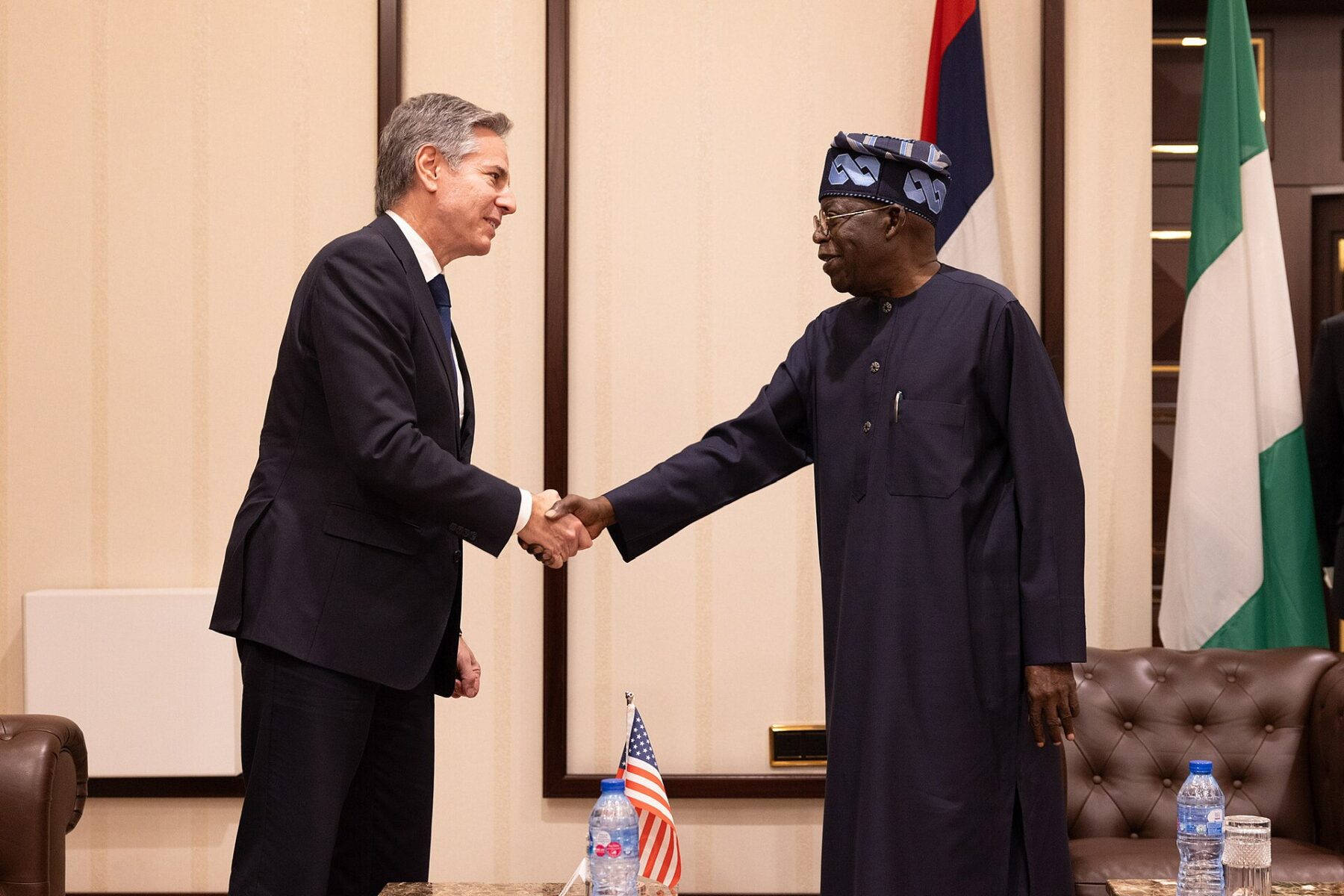 Bola Tinubu, Nigeria's president, shakes hands with then US Secretary of State Antony Blinken in Abuja