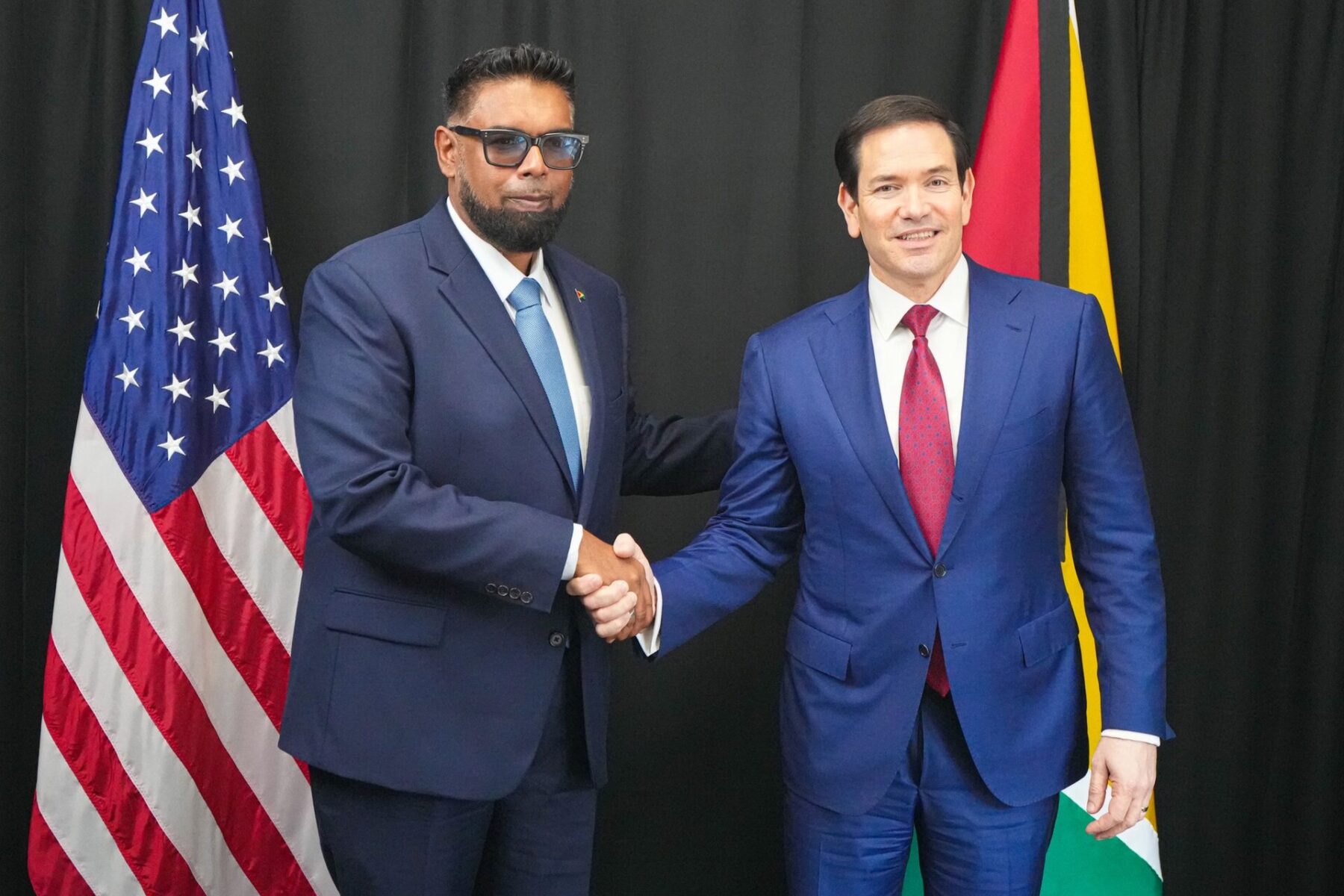 Irfaan Ali, Guyana's president, shakes hands with US Secretary of State Marco Rubio in Basseterre in February 2026