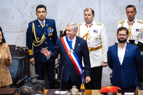 José Antonio Kast wearing the presidential sash beside outgoing president Gabriel Boric at the handover in Congress on 11 March 2026