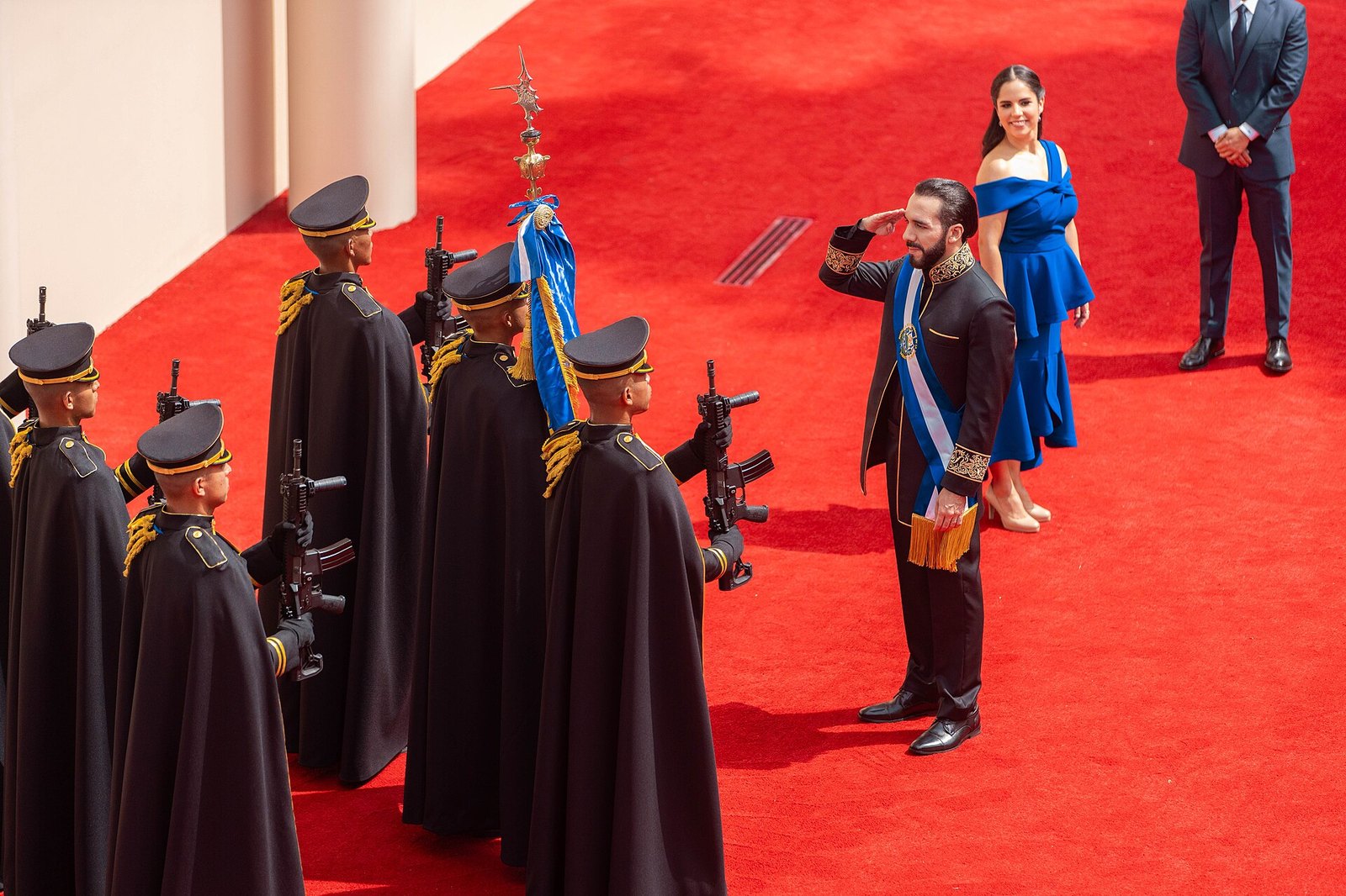 Nayib Bukele saluting soldiers at his second inauguration on 1 June 2024