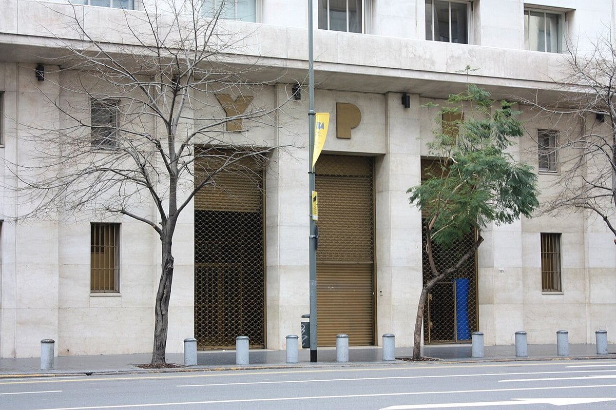 The street frontage of the former YPF building in Buenos Aires, with the company's lettering above the doorways