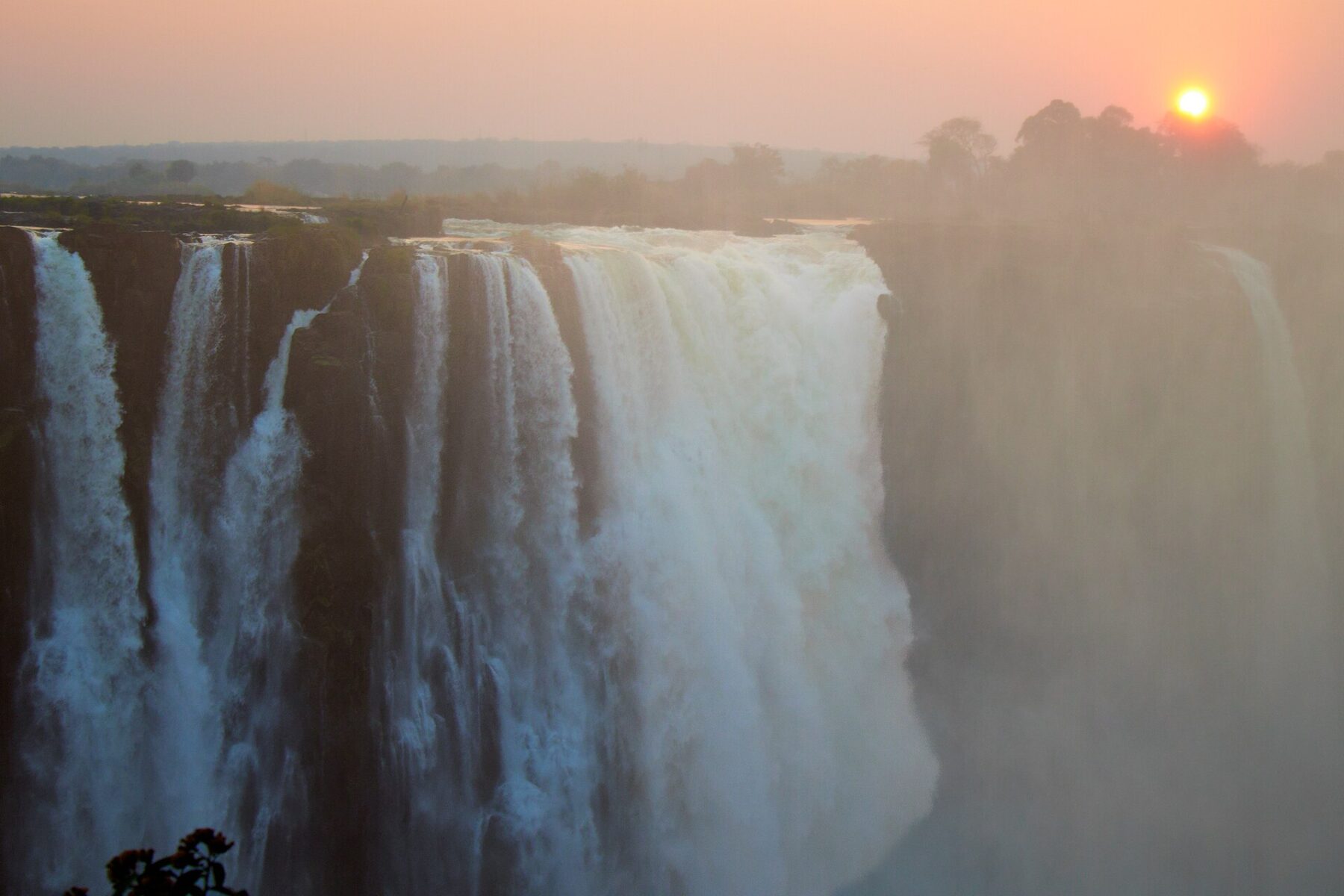zimbabwe visa and residency Victoria Falls Zambezi River at sunset