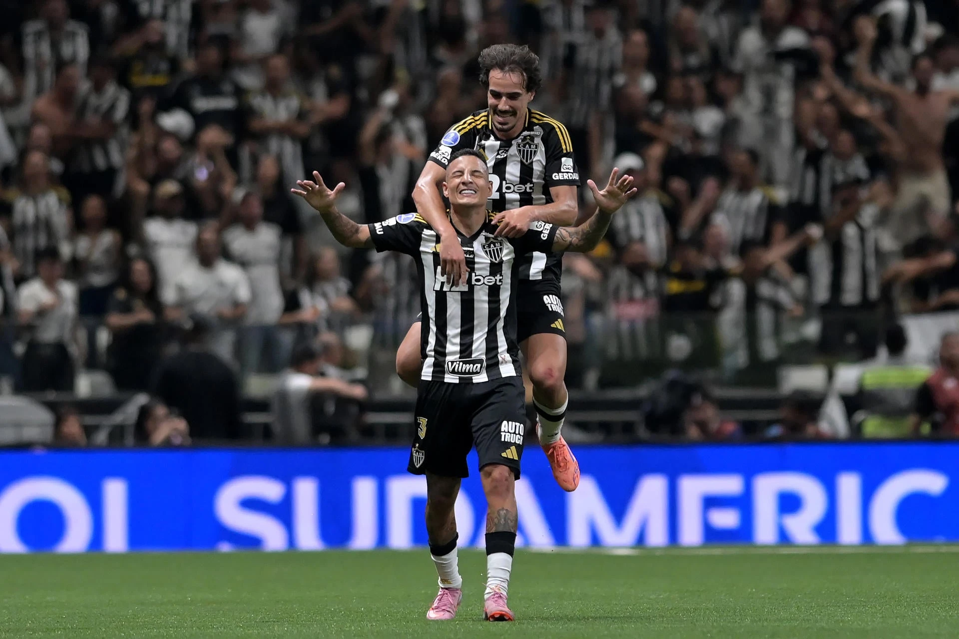 Atlético Mineiro fans fill the stands of the Arena MRV stadium in Belo Horizonte, Brazil, under floodlights