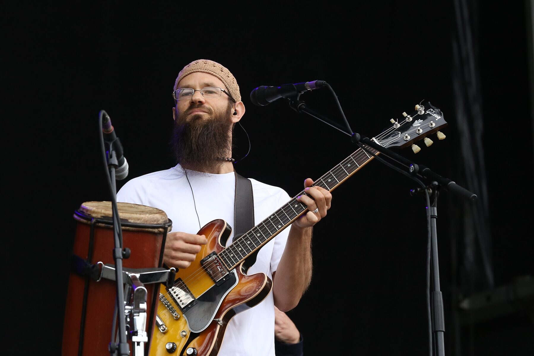 Groundation guitarist performing on stage at Chiemsee Reggae Summer