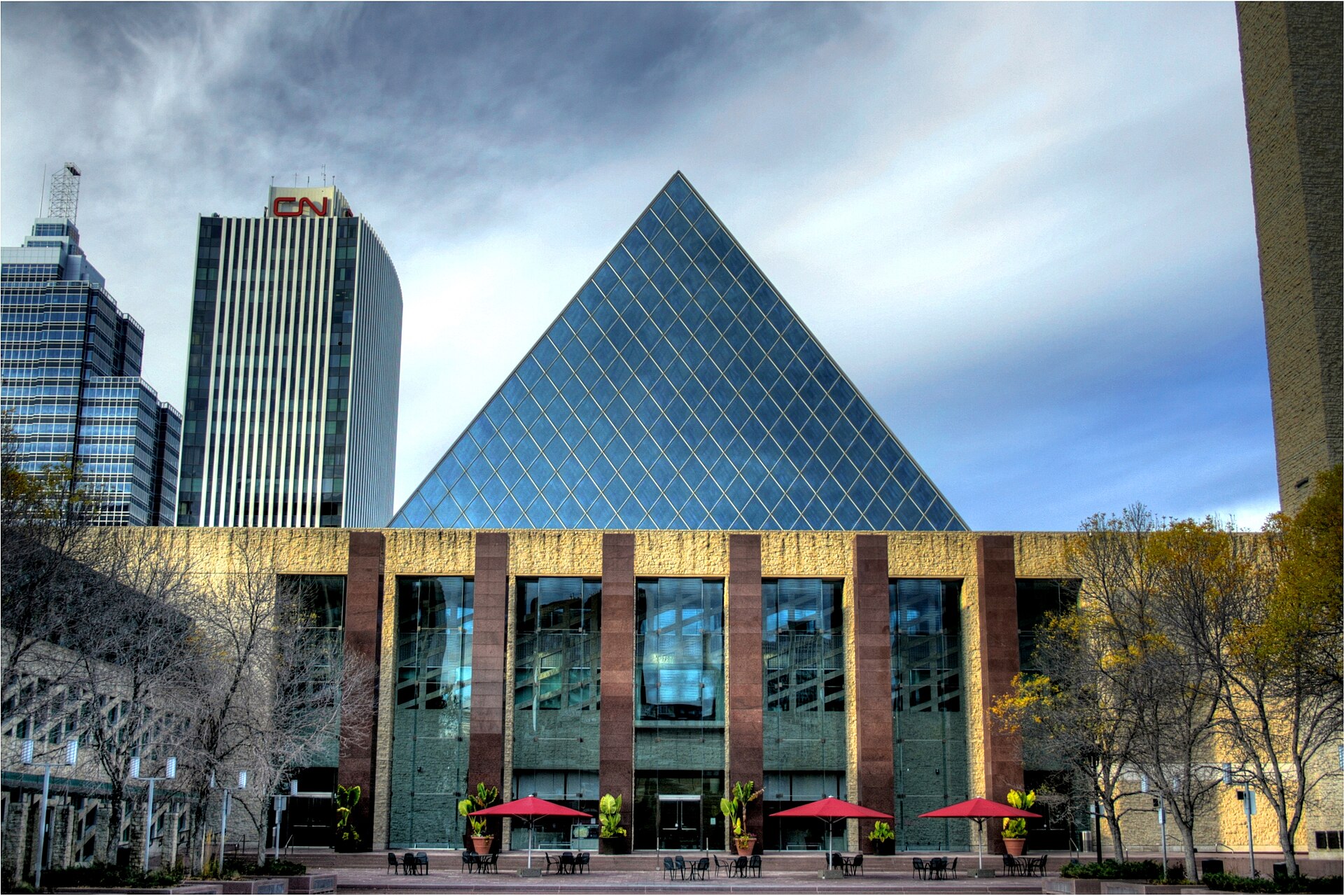 South face of Edmonton City Hall, a glass pyramid above a brick base, in Alberta, Canada.