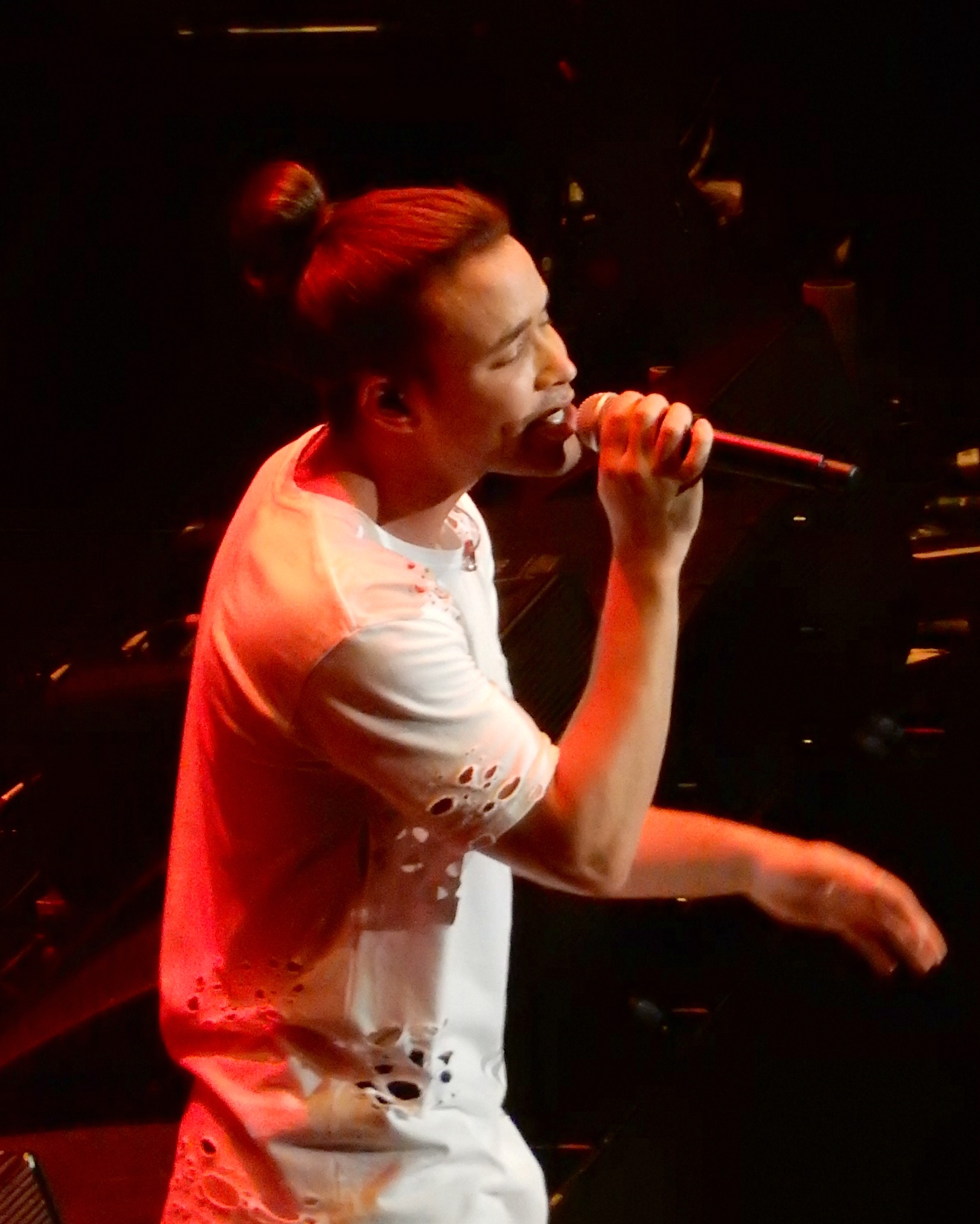 Prince Royce singing on stage