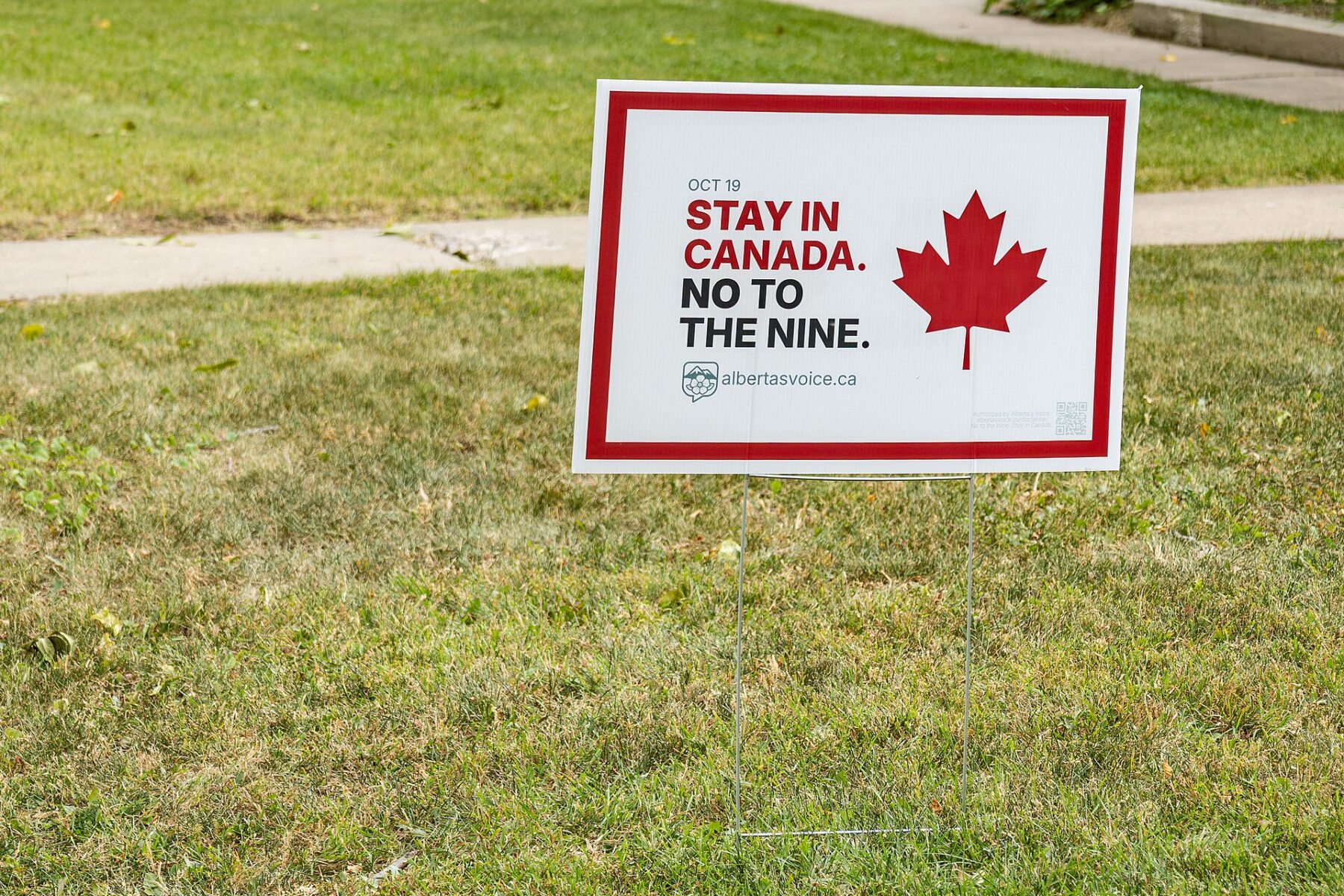 A lawn sign reading Stay in Canada, No to the Nine, placed ahead of the 2026 Alberta independence referendum in Edmonton.