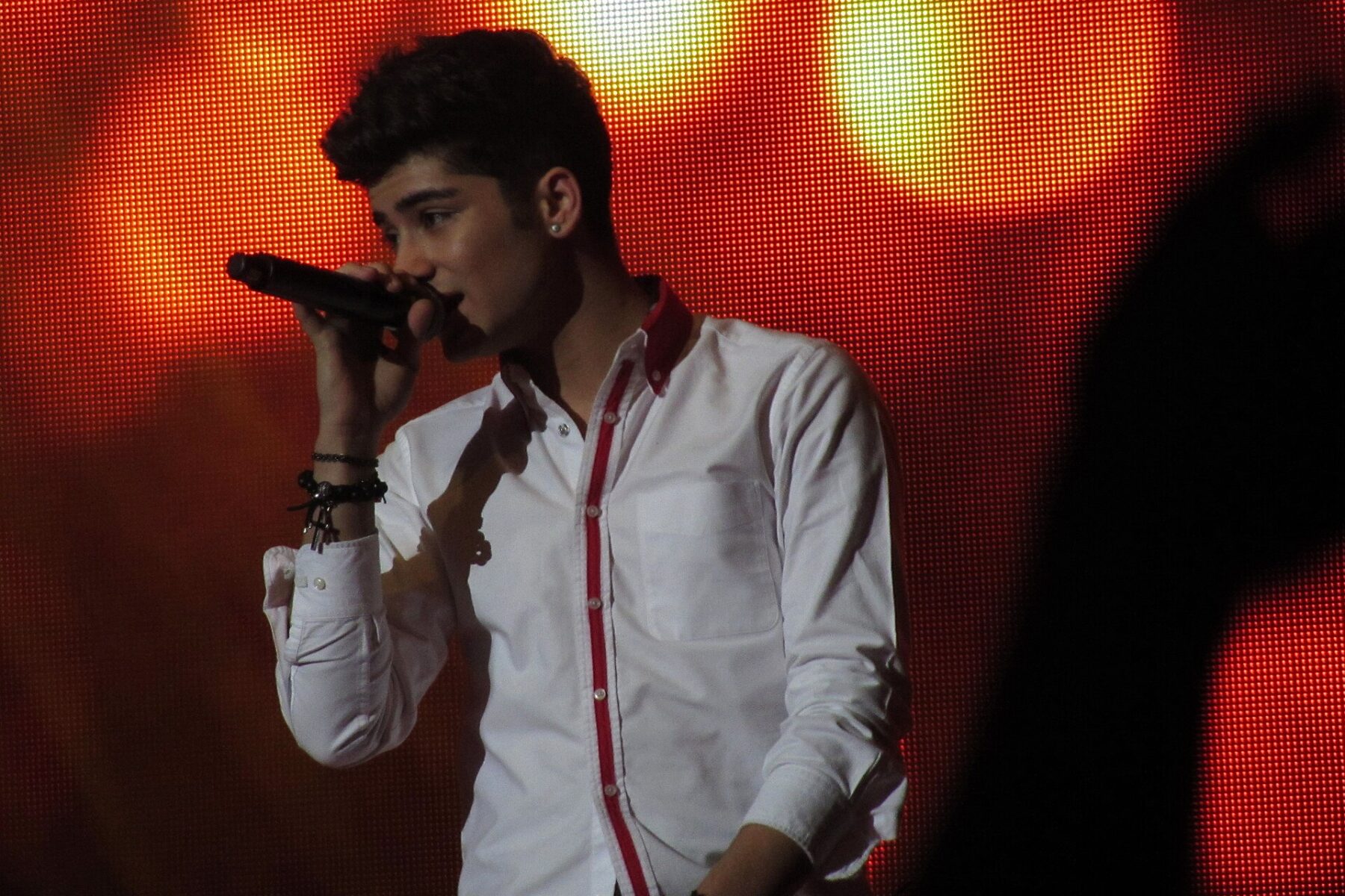 Zayn performing on stage
