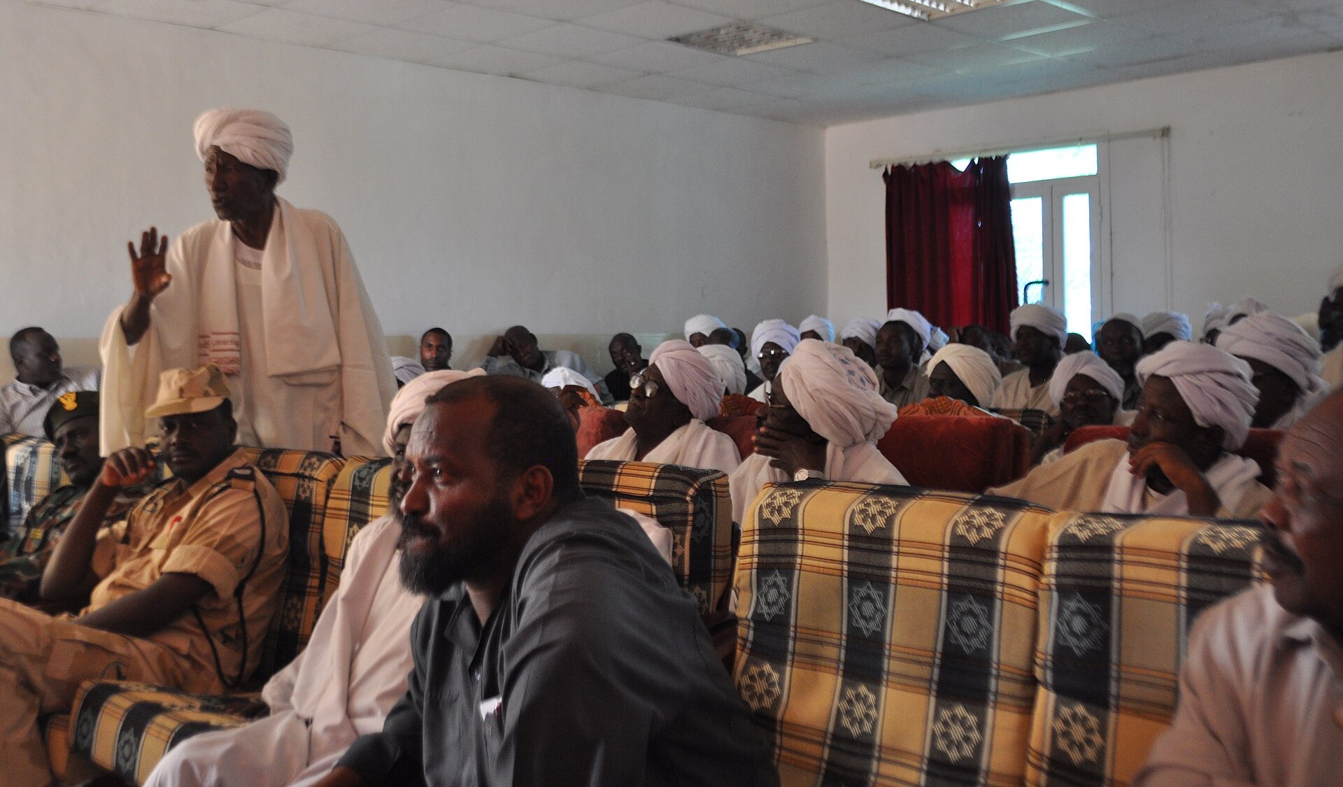A Misseriya elder stands and speaks at a community meeting in Sudan in November 2009