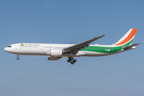 Air Côte d'Ivoire Airbus A330-900 in flight with orange, white and green tail