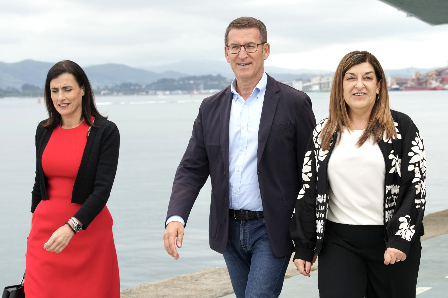 Alberto Núñez Feijóo, leader of Spain's People's Party, walking on the waterfront in Santander