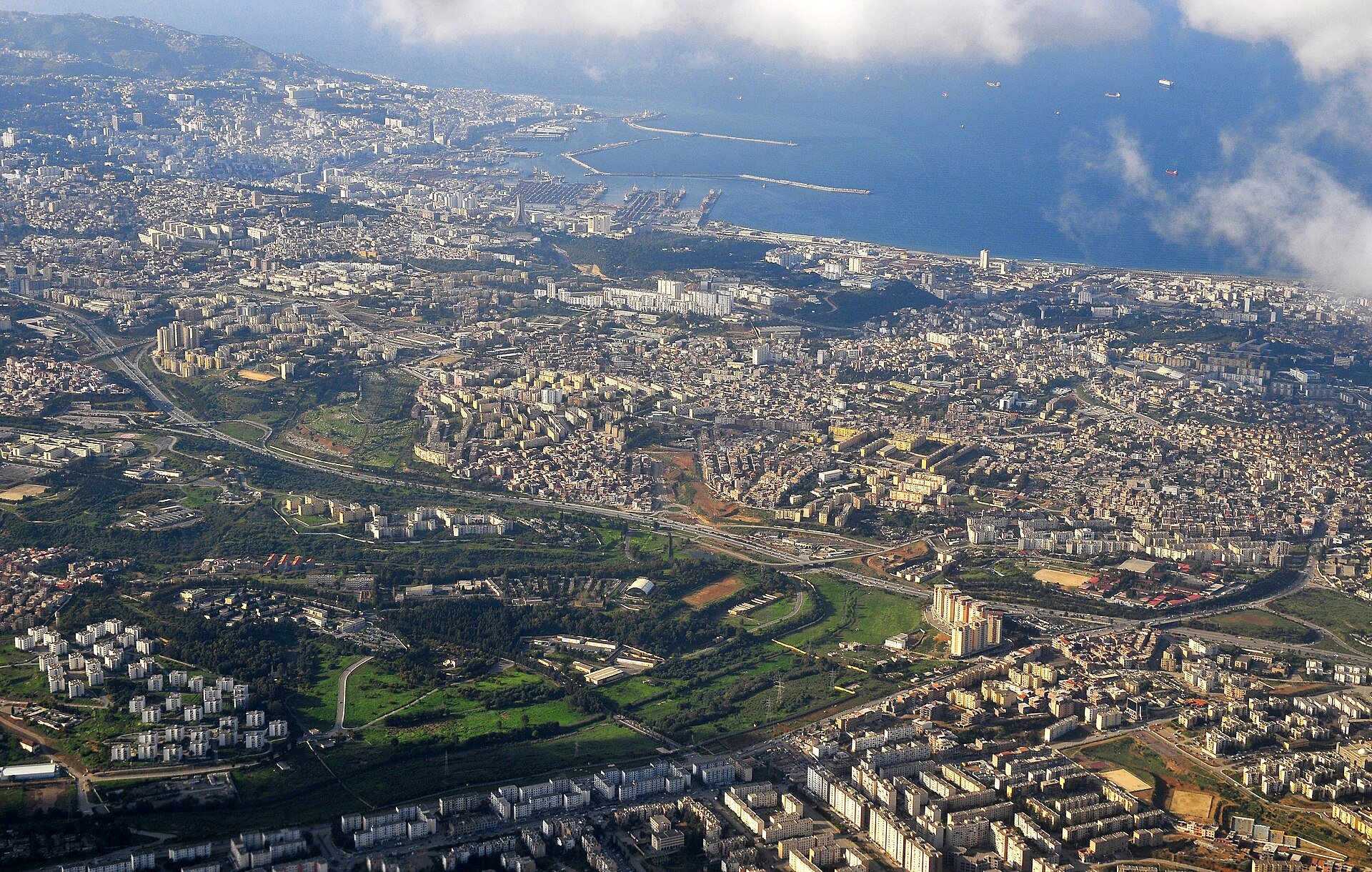 Aerial view of Algiers with its harbour, apartment blocks and the Mediterranean coast