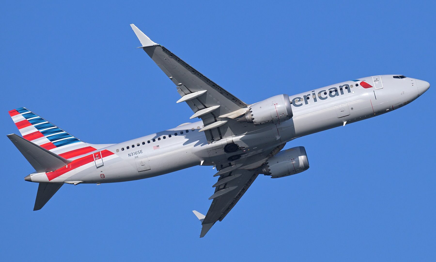 An American Airlines Boeing 737-8 MAX climbing out after takeoff, the aircraft type used on the Miami to Georgetown flight