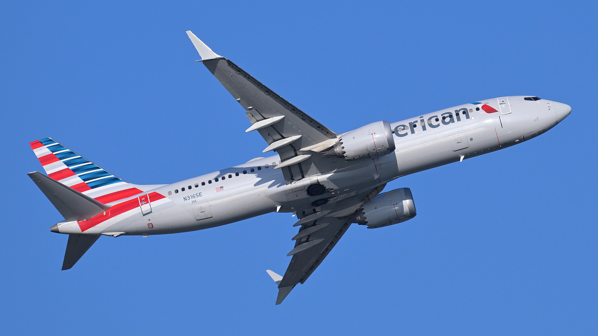 An American Airlines Boeing 737-8 MAX climbing out after takeoff, the aircraft type used on the Miami to Georgetown flight