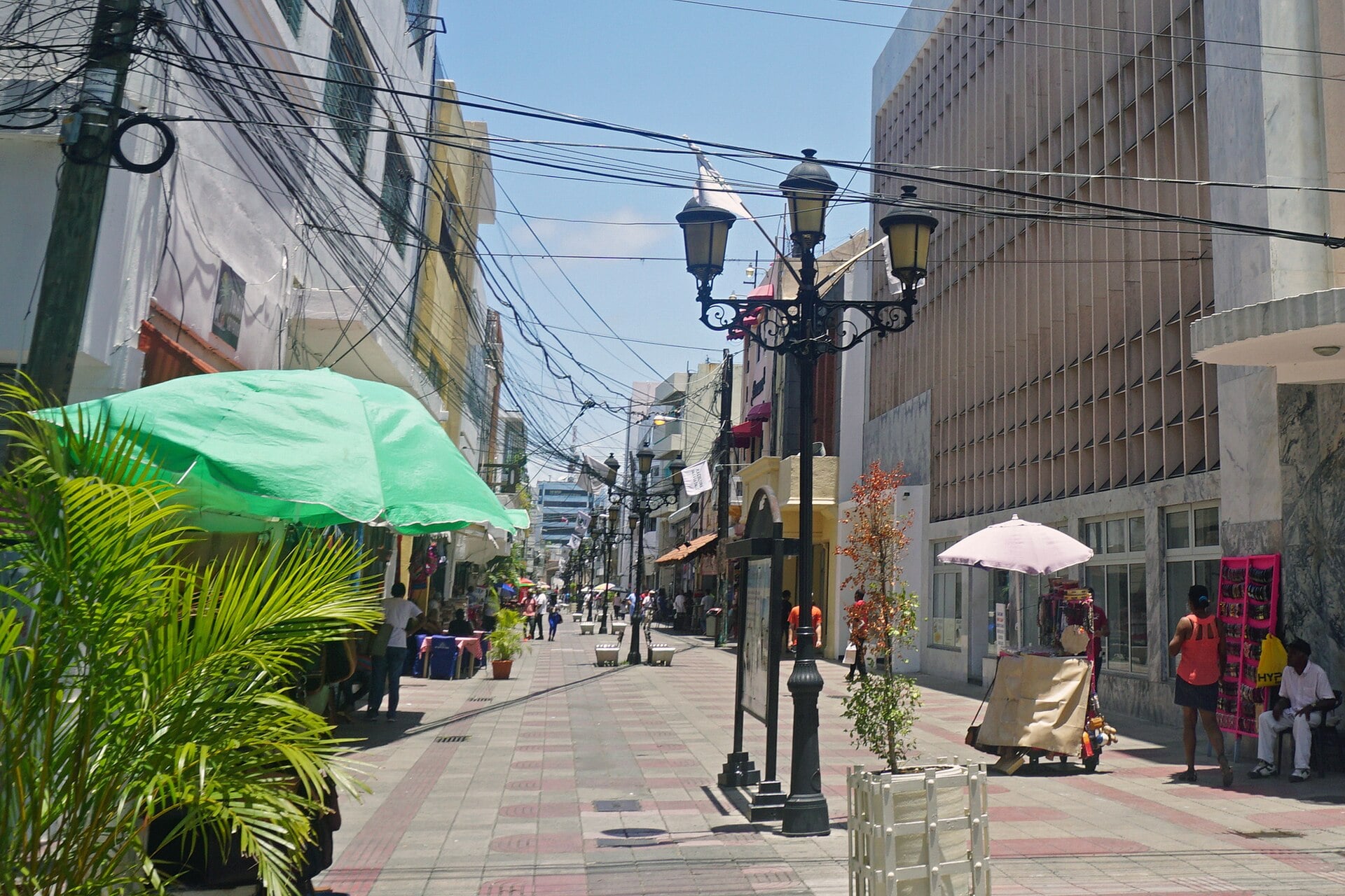 Shoppers on Calle El Conde, the pedestrian shopping street in the Colonial City of Santo Domingo, Dominican Republic