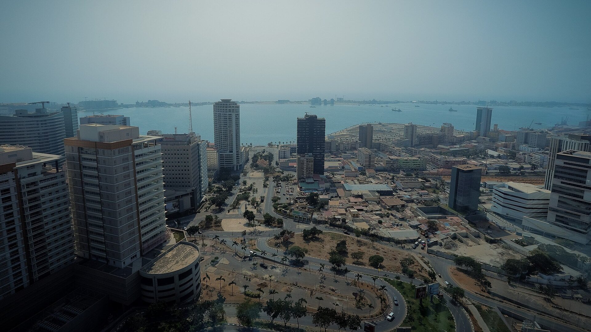 Downtown Luanda with office towers, avenues and the bay in the haze