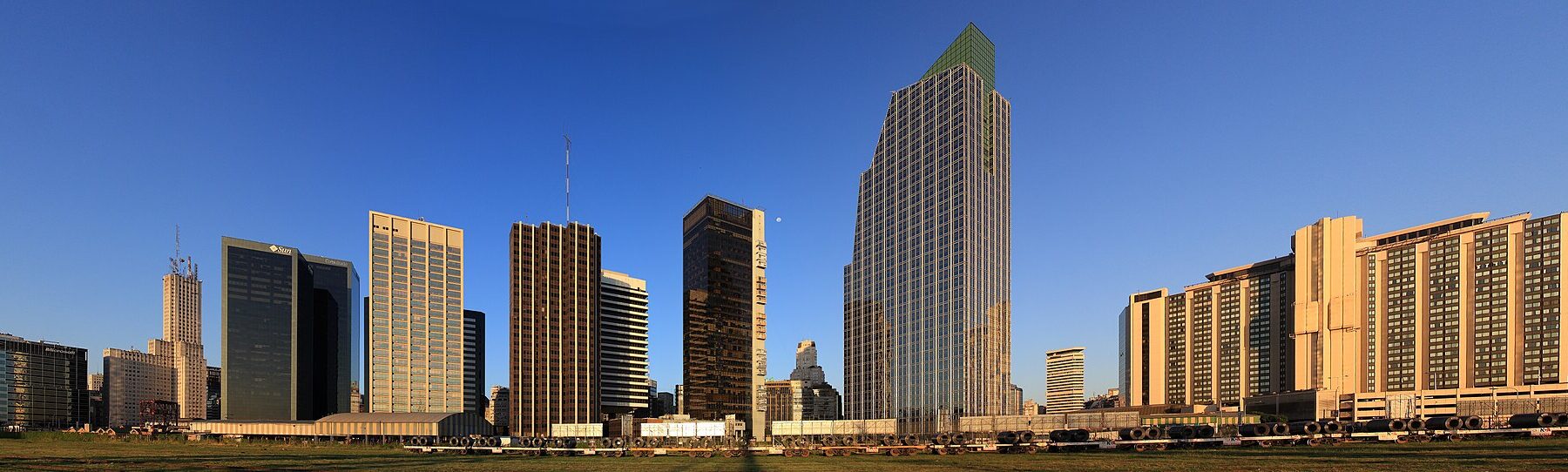 Office towers in central Buenos Aires seen in a wide panorama under a blue sky