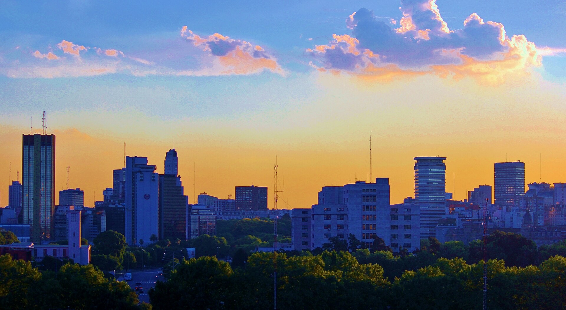 Office towers and parkland in Buenos Aires at sunset