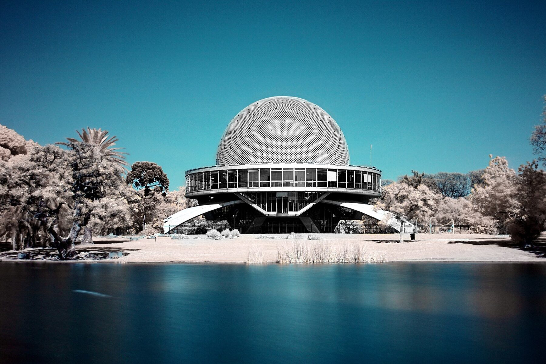 Galileo Galilei Planetarium in Buenos Aires, a MUTEK Argentina 2026 venue, seen across a lake