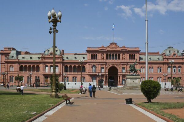 The pink Casa Rosada, the Argentine presidential palace, seen across Plaza de Mayo in Buenos Aires on a sunny day