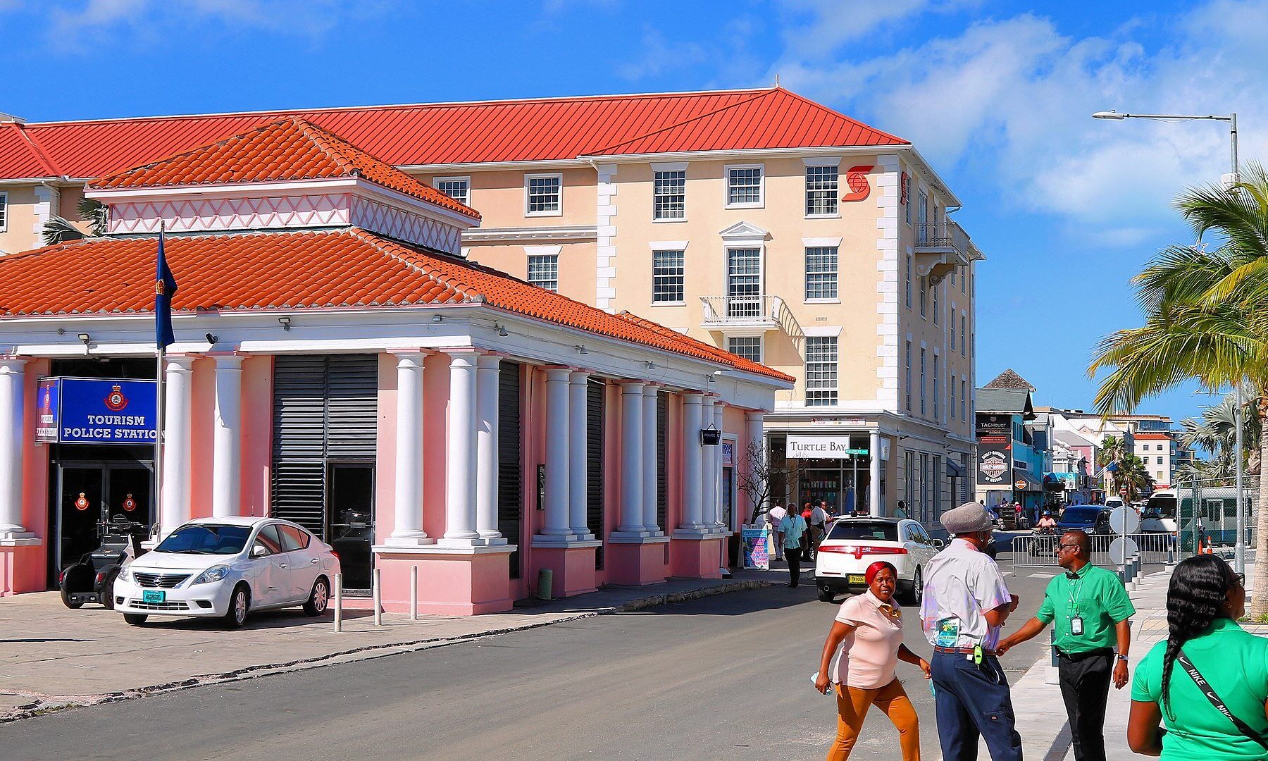Woodes Rogers Walk in downtown Nassau with a tourism police station and a bank building
